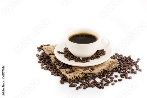 Coffee cup with beans on hemp sack