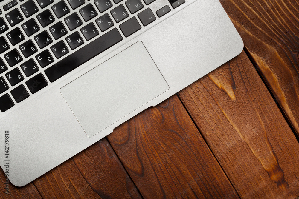 Laptop, notebook on work wooden desk Laptop, notebook on work wooden desk