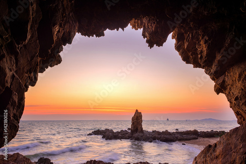 The rocks on the beach, beautiful stone sunset Background Pattaya in Thailand