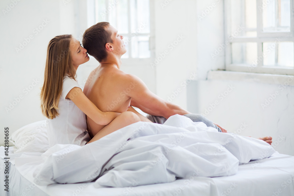Lifestyle. Beautiful couple in bed Lifestyle. Beautiful couple in bed