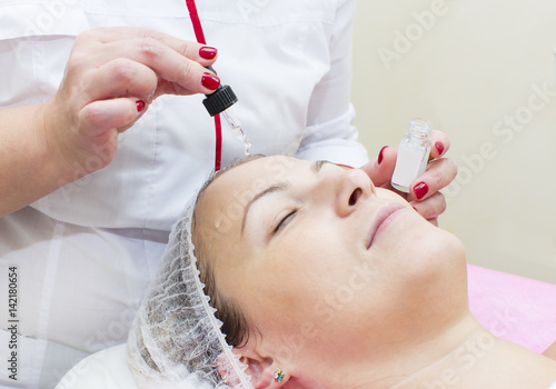 Process of massage and facials in beauty salon  © lester120