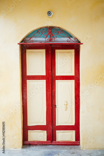 Red and yellow old door © Watercolor_Art_Photo