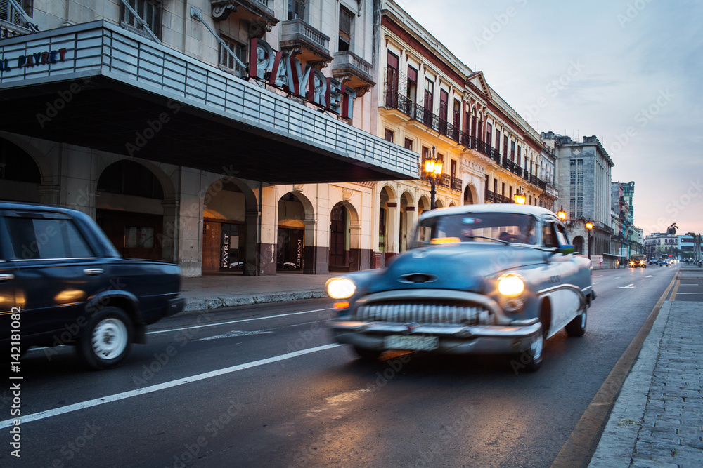 Old car on street of Havana at sunrise, Cuba
