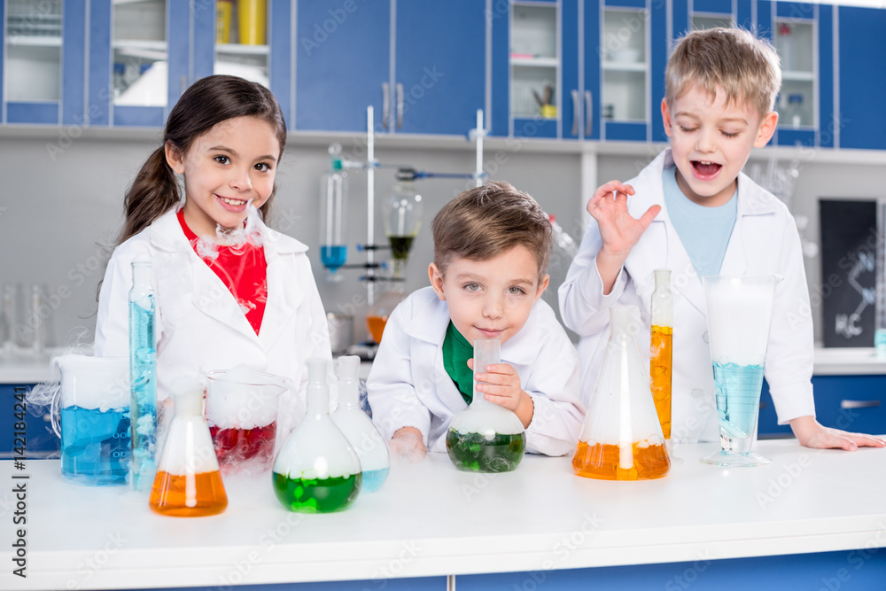 Kids in chemical laboratory Kids in chemical laboratory