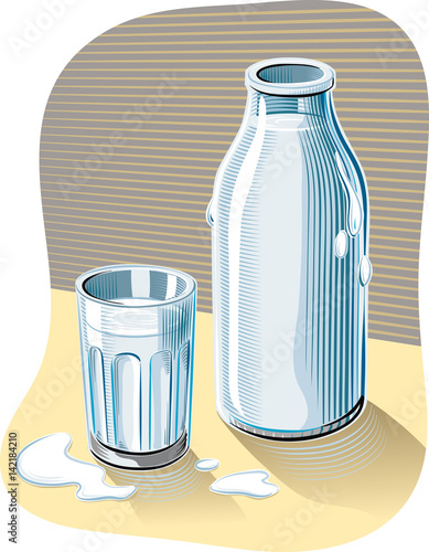 Glass and bottle of fresh pasteurized milk leaning on a table.