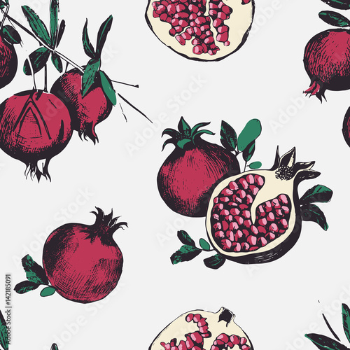 Seamless pattern with pomegranates. Fruits on white background.