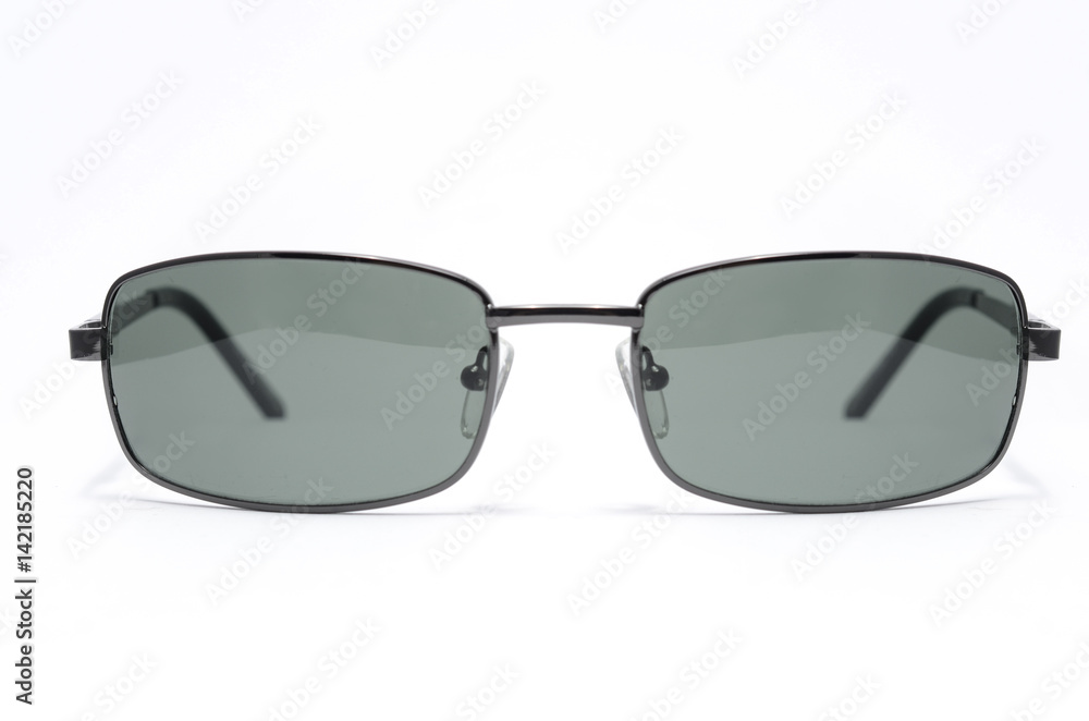 Rectangular Sunglasses in a thin metal frame on a white background Rectangular Sunglasses in a thin metal frame on a white background