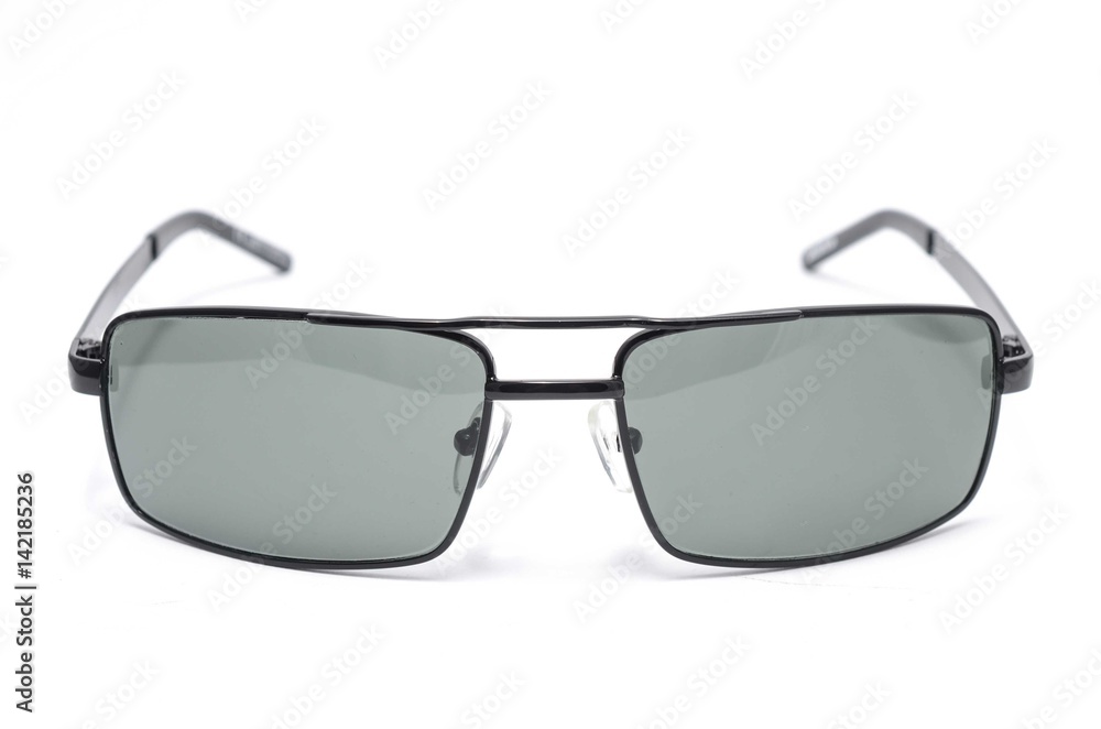 Rectangular Sunglasses in a thin metal frame on a white background Rectangular Sunglasses in a thin metal frame on a white background