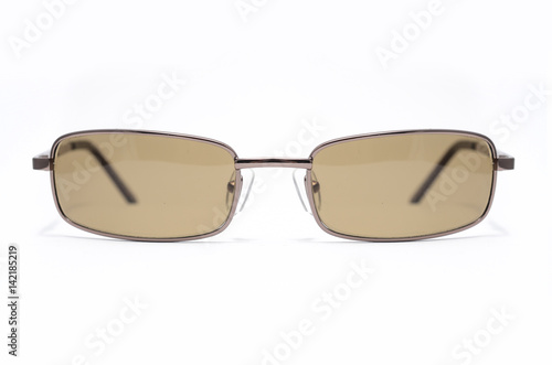 Men's sunglasses with brown glasses in metal frame isolated on white