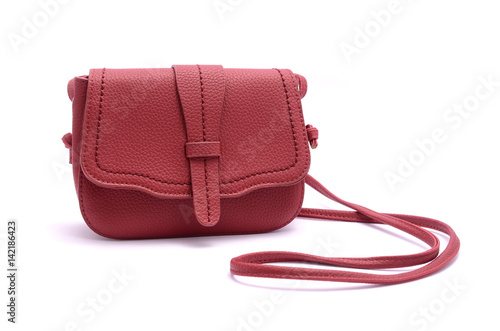 Red leather clutch isolated on white