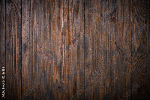 Dark old wooden planks table texture background top view