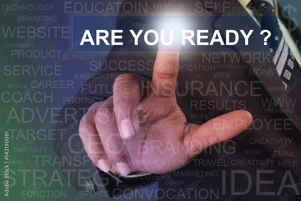 Businessman touching are you ready button on virtual screen Businessman touching are you ready button on virtual screen