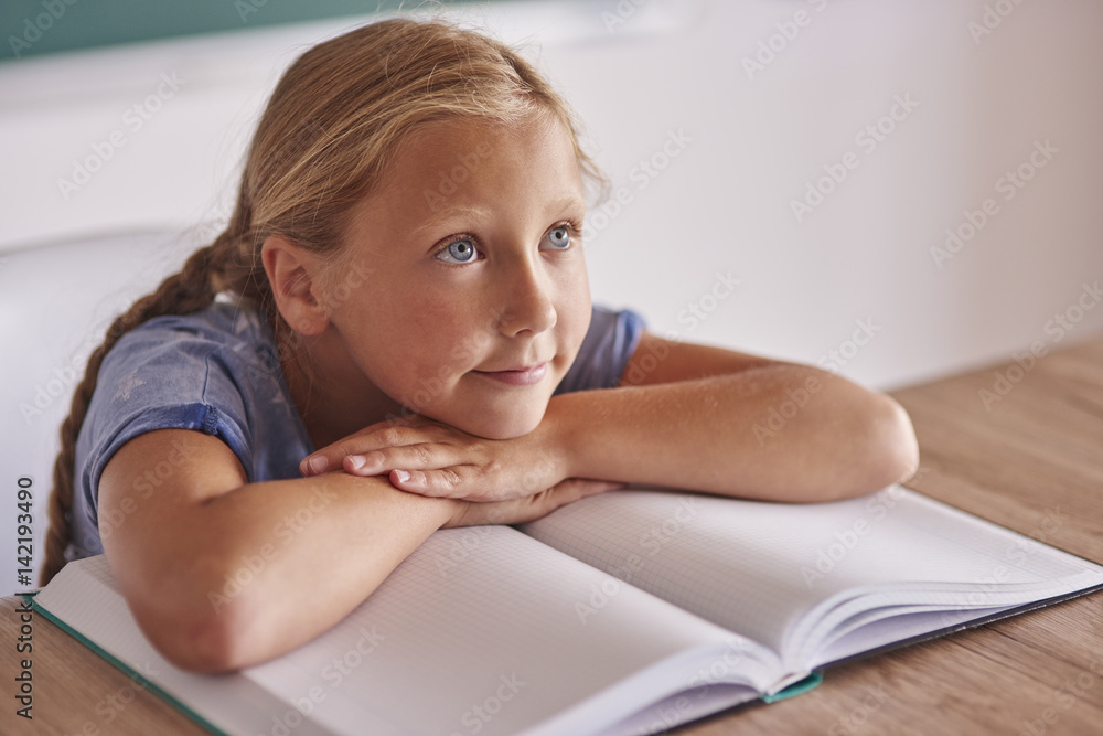 Pensive blond hair girl looking away Pensive blond hair girl looking away