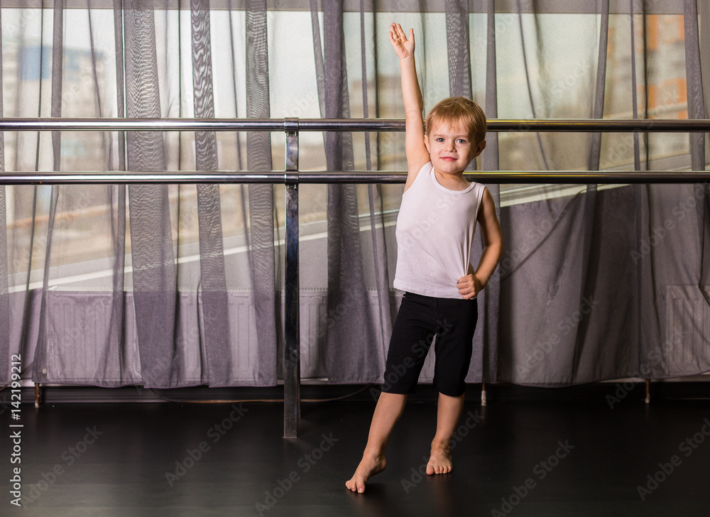 Little boy dancer in a dance studio