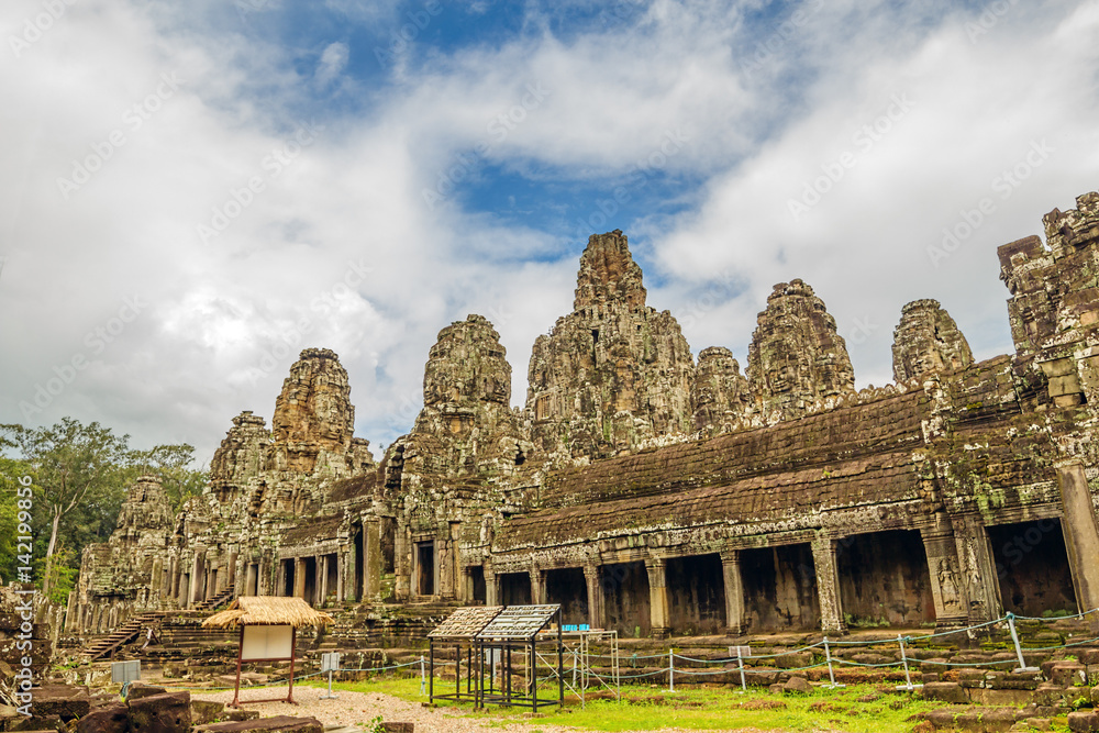 Ancient ruins of Bayon Temple at Angkor area.