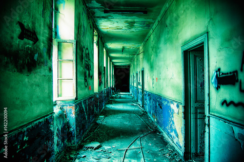 Corridor in an abandoned hospital  photo