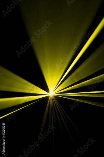Fototapeta Naklejka Na Ścianę i Meble -  Laser beam yellow on a black background
