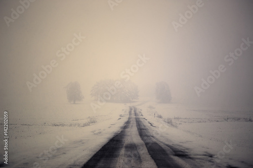 Road in bad weather conditions in winter © makam1969