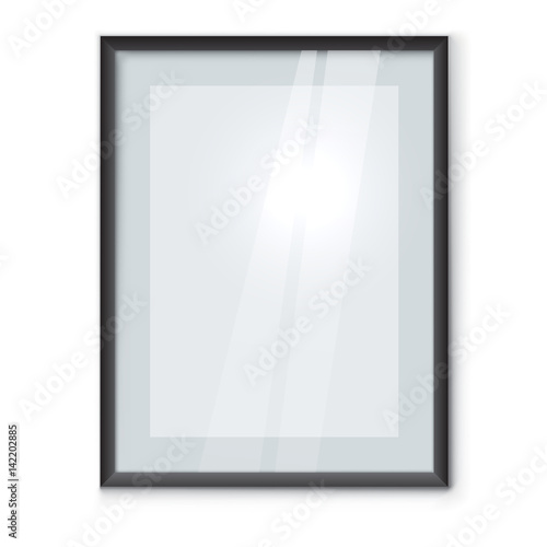 Blank picture frame with black rim hanging on the wall