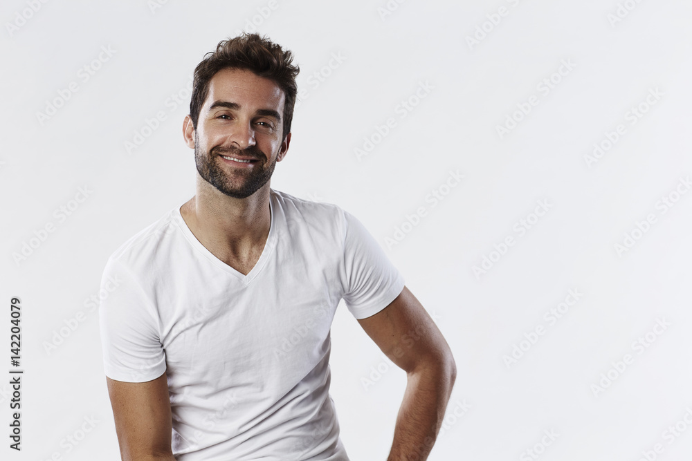 Smiling guy in white t-shirt, portrait Smiling guy in white t-shirt, portrait
