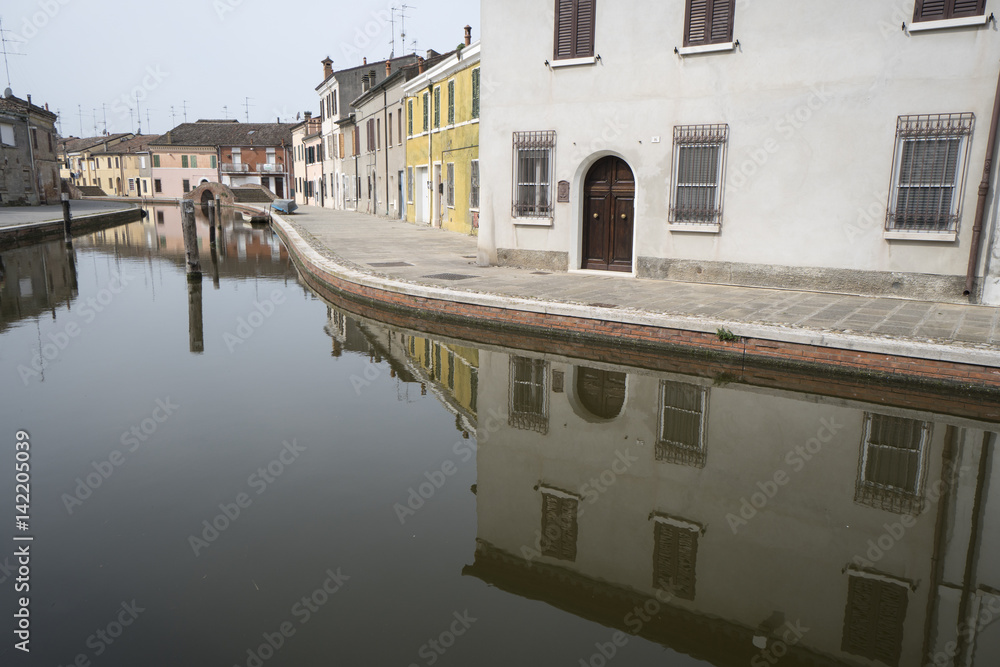 Comacchio, Ferrara, Italy: houses reflected in the canal