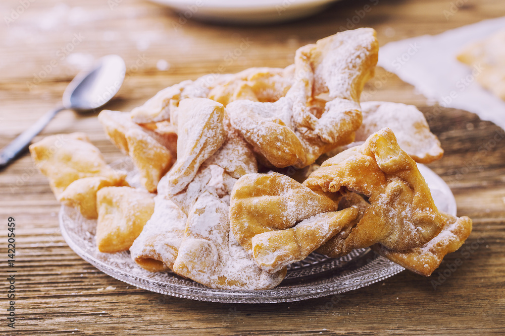 A pile of fresh, homemade Angel Wings/ faworki A pile of fresh, homemade Angel Wings/ faworki