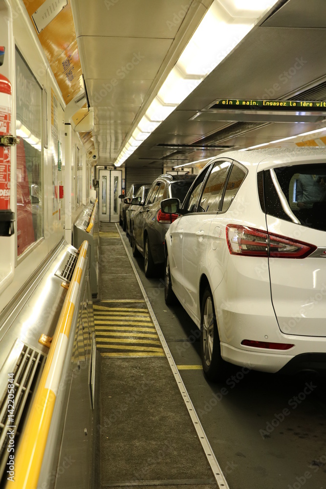Obraz premium Cars in a shuttle train for motor vehicles, between France and United Kingdom