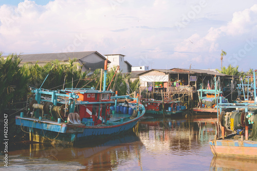 colorful fishing boat at sea port in fish village, sekinchan malaysia.
