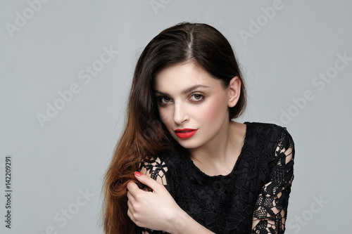 Portrait of a girl with a beautiful make-up and who has long hair
