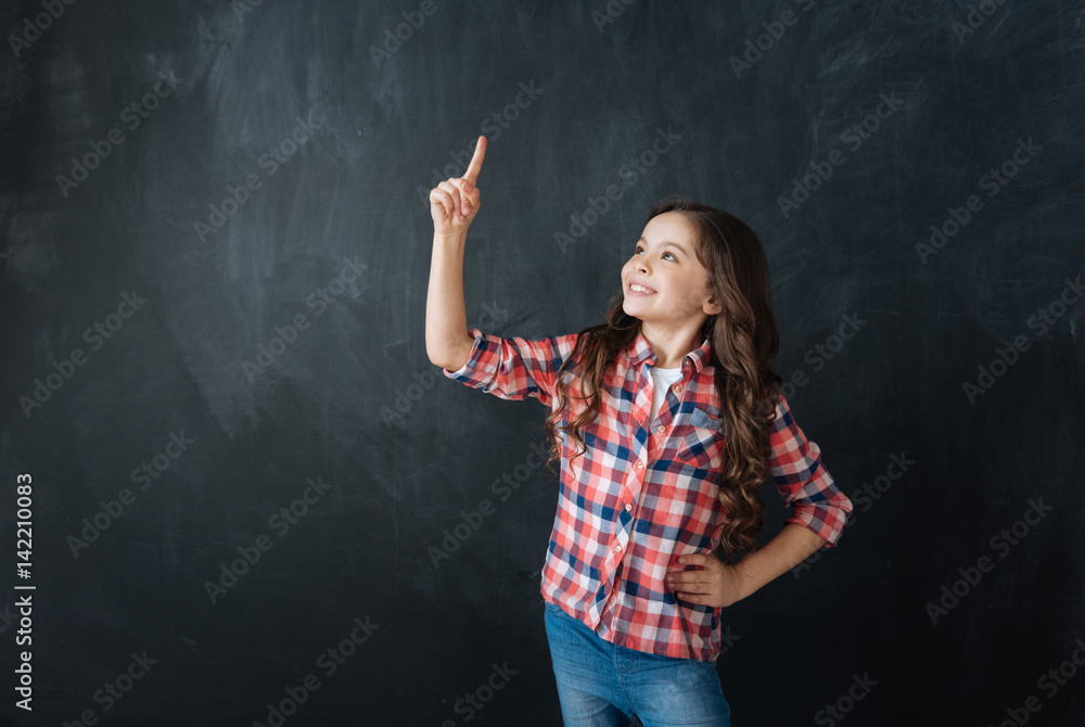 Inventive little girl having fun in the studio Inventive little girl having fun in the studio