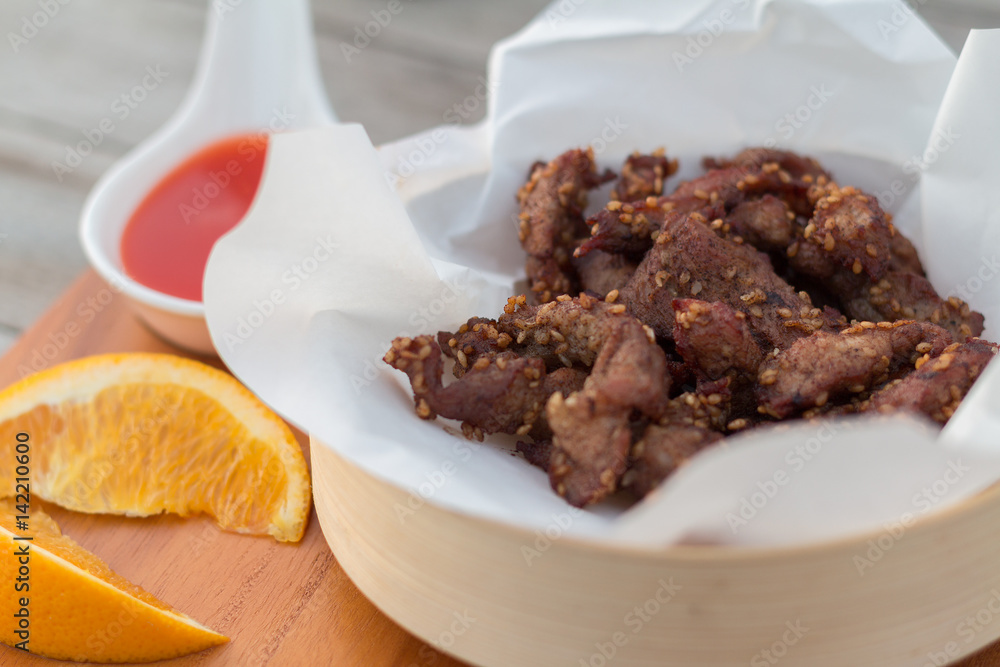 Deep fried pork that serve with ketchup Deep fried pork that serve with ketchup