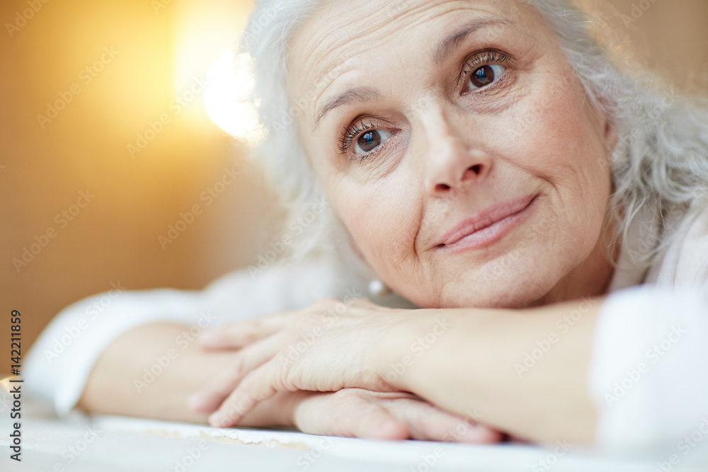 Tranquil senior woman having rest Tranquil senior woman having rest