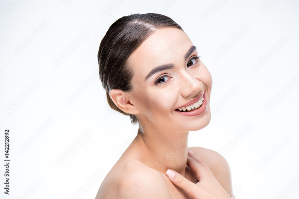 Woman smiling and looking at camera Woman smiling and looking at camera