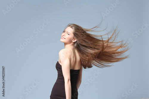 Beautiful young woman with ...