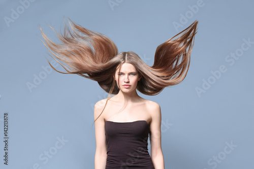 Beautiful young woman with ...