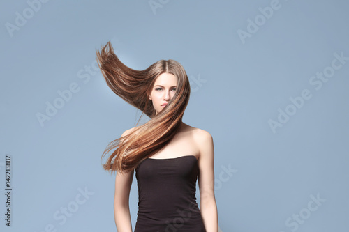 Beautiful young woman with ...