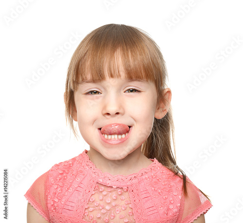 Cute little girl on white b...