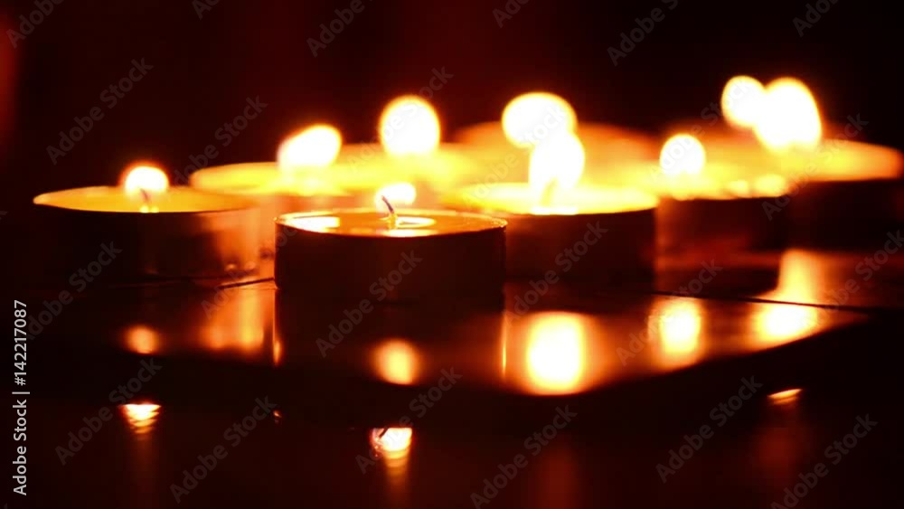 Burning candles. Candles light background. Candle flame at night. Burning candles. Candles light background. Candle flame at night.
