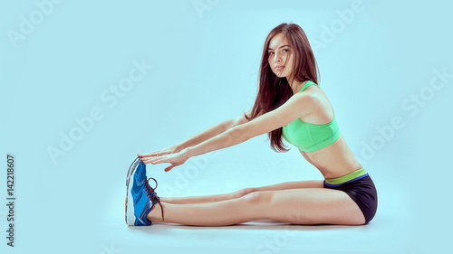 A girl with a sports body, attractive fitness woman, trained female body, lifestyle portrait, caucasian model