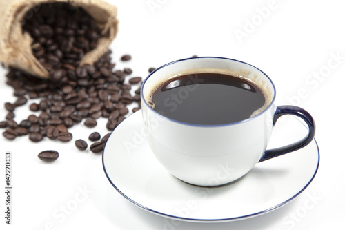 Coffee in white cup and blur coffee seed in sack for background  Isolate image