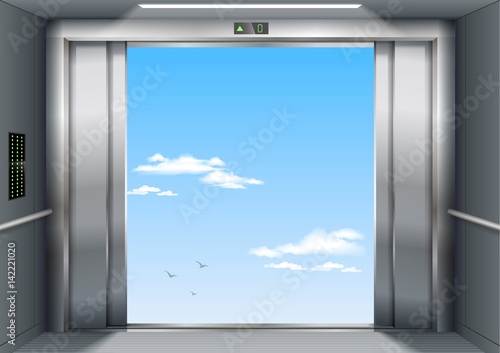 Open to sky door of the freight elevator hospital or office building. Metal armored sliding door.