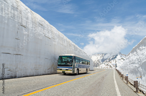 Blur windshield bus move along snow wall at japan alps tateyama kurobe alpine route