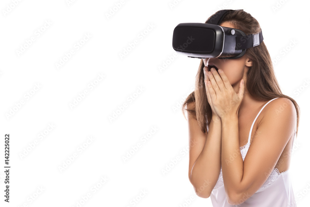 Woman is using VR headset Woman is using VR headset