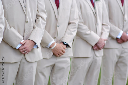 Groomsmen in sand colored suits
