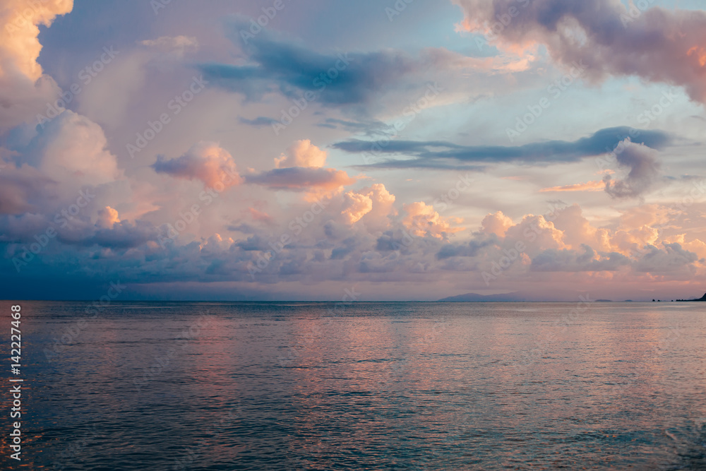 Beautiful colorful sky and calm sea on sunset Beautiful colorful sky and calm sea on sunset