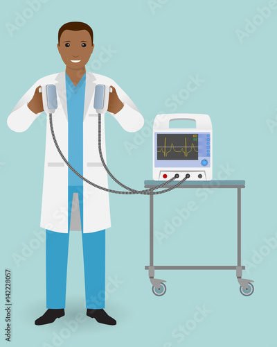 Emergency doctor with a defibrillator in his hand is ready to influence. Medical employee. Doctor specialization.