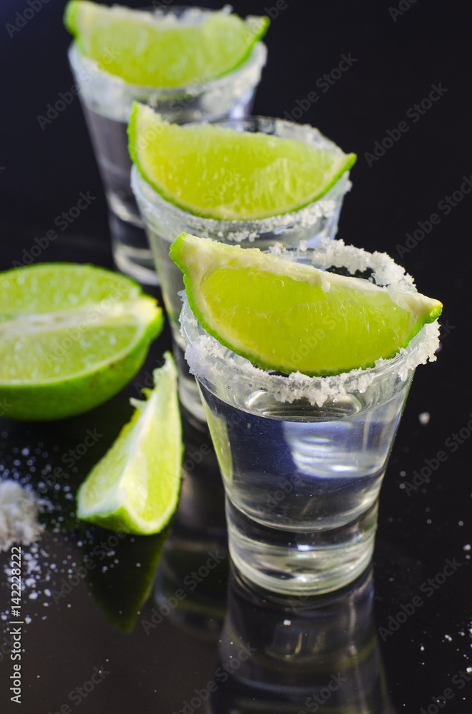 Silver tequila with lime and salt Silver tequila with lime and salt