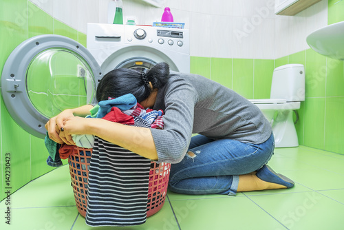 Woman tired of washing.