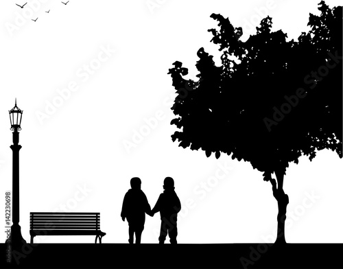 Boys together to walk on the beach, one in the series of similar images silhouette