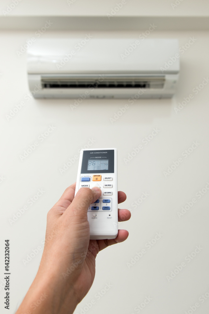 Fototapeta premium Air conditioner and remote control